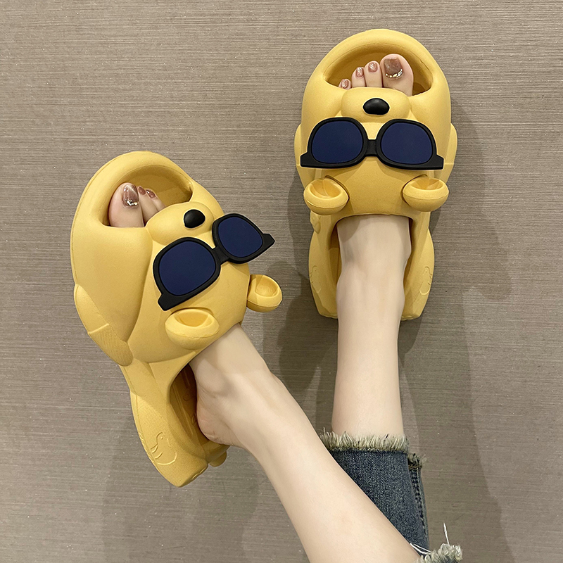 Yellow sunglasses and teddy bear sandals